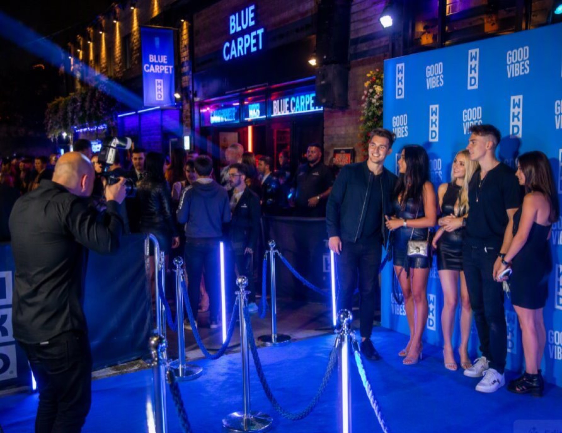 People enjoying a WKD branded On Trade activation
